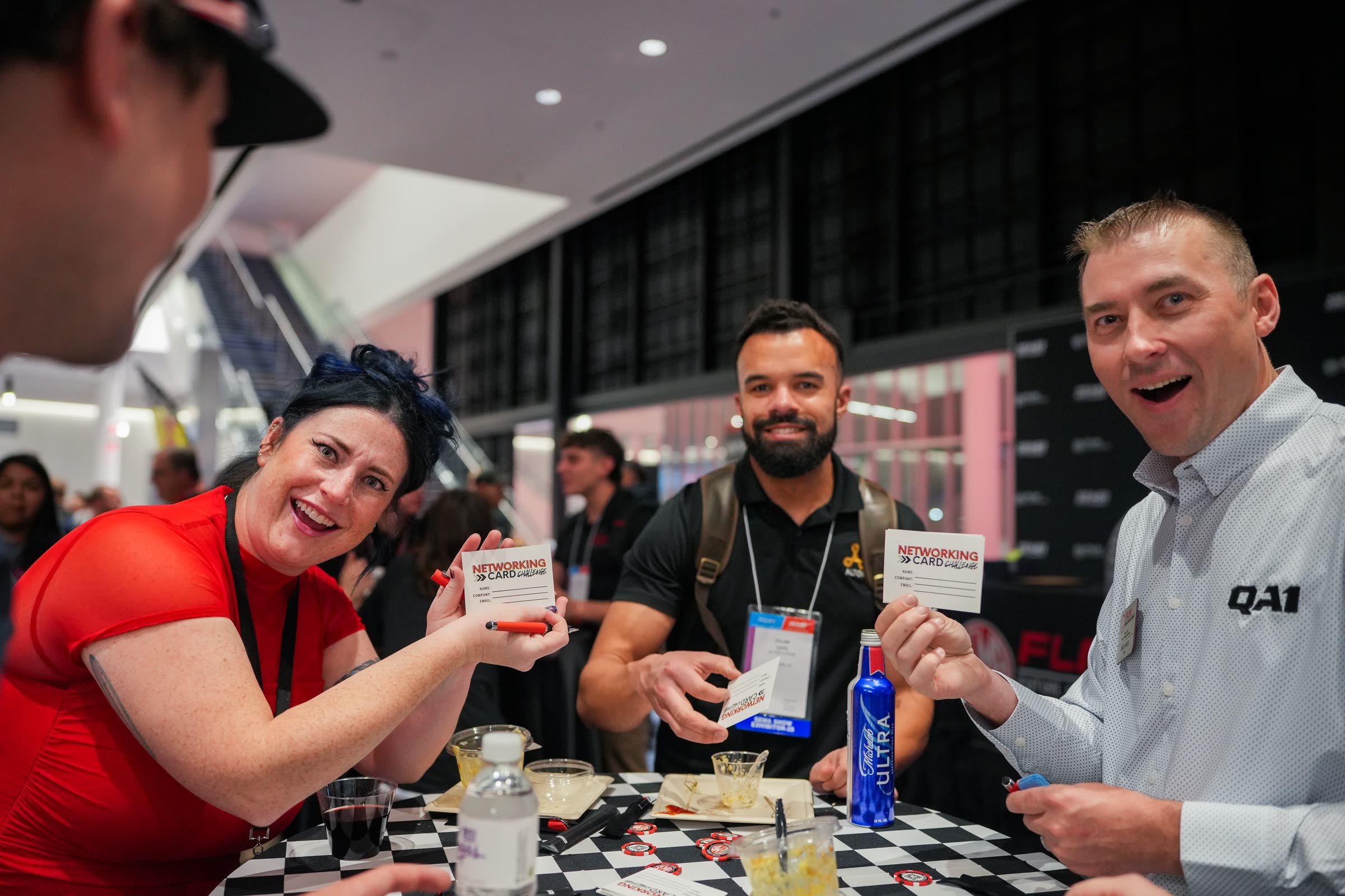 Industry professionals networking at SEMA