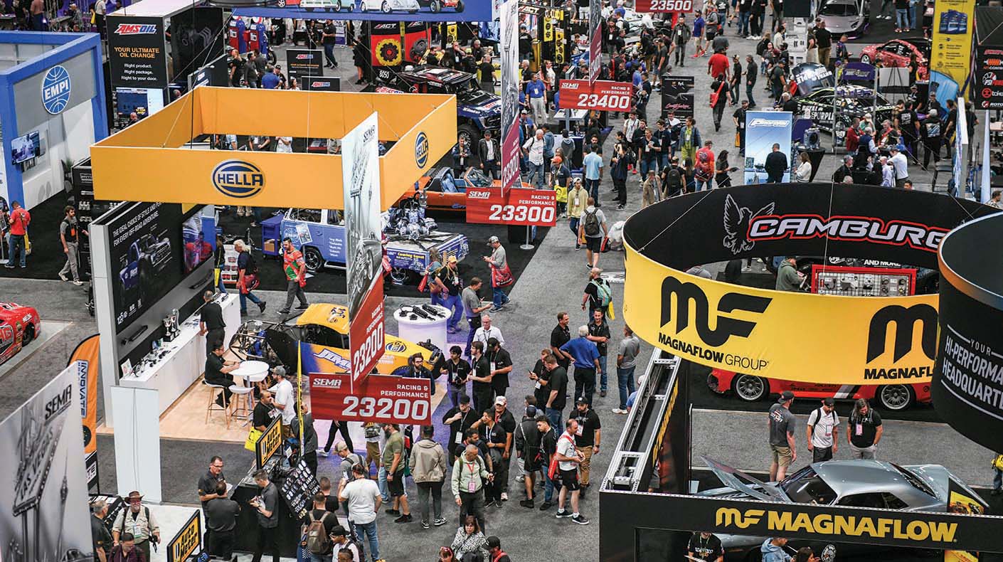 Aerial view of show floor with crowds and booths