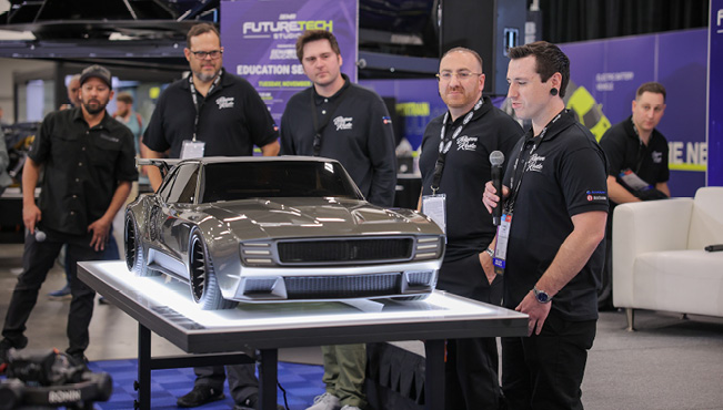 People Showcasing Futuristic Car Model