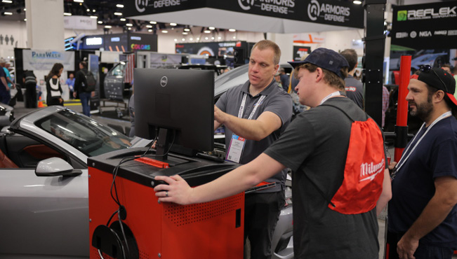 People at Tech Booth