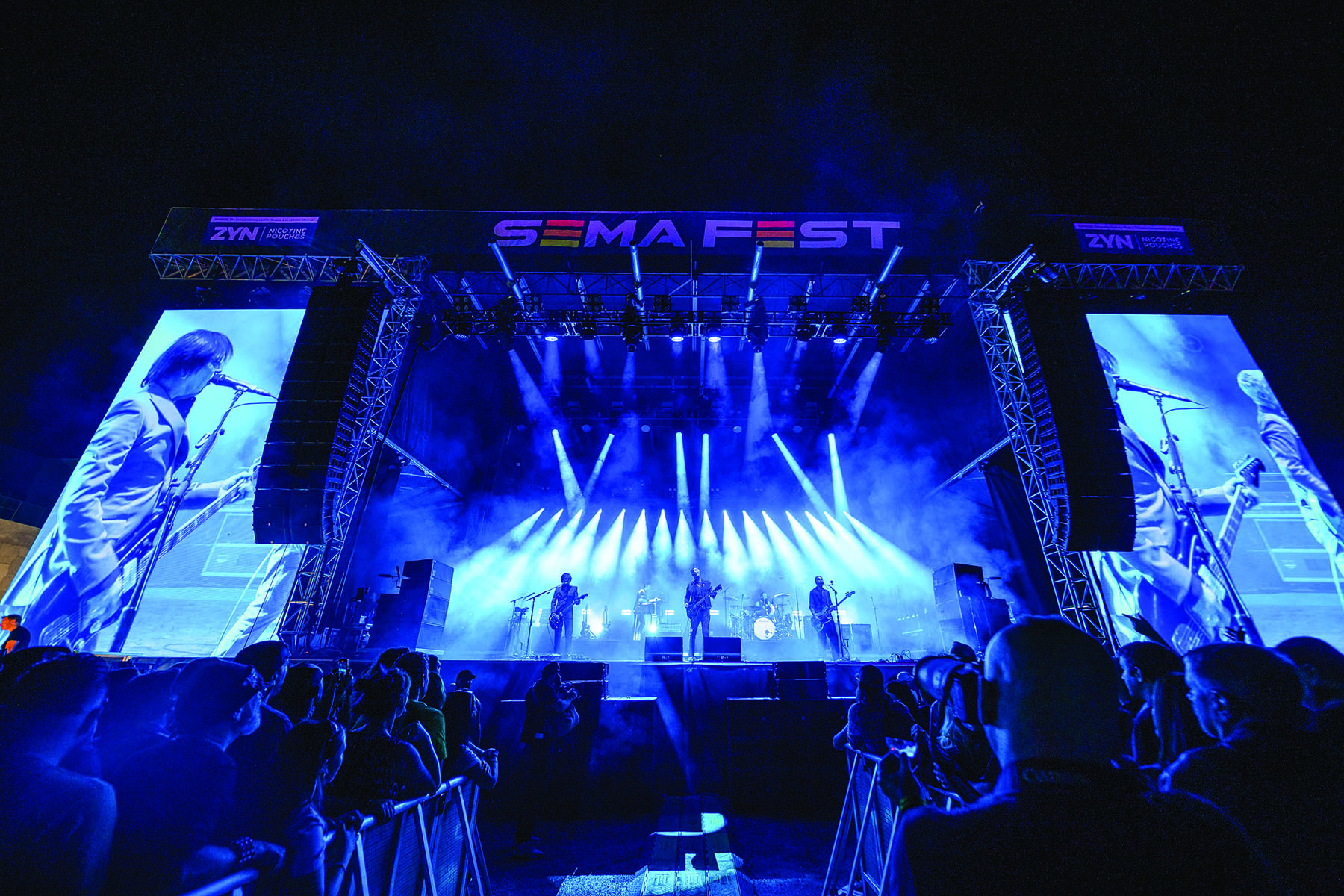 SEMA Fest stage lit up with band performin