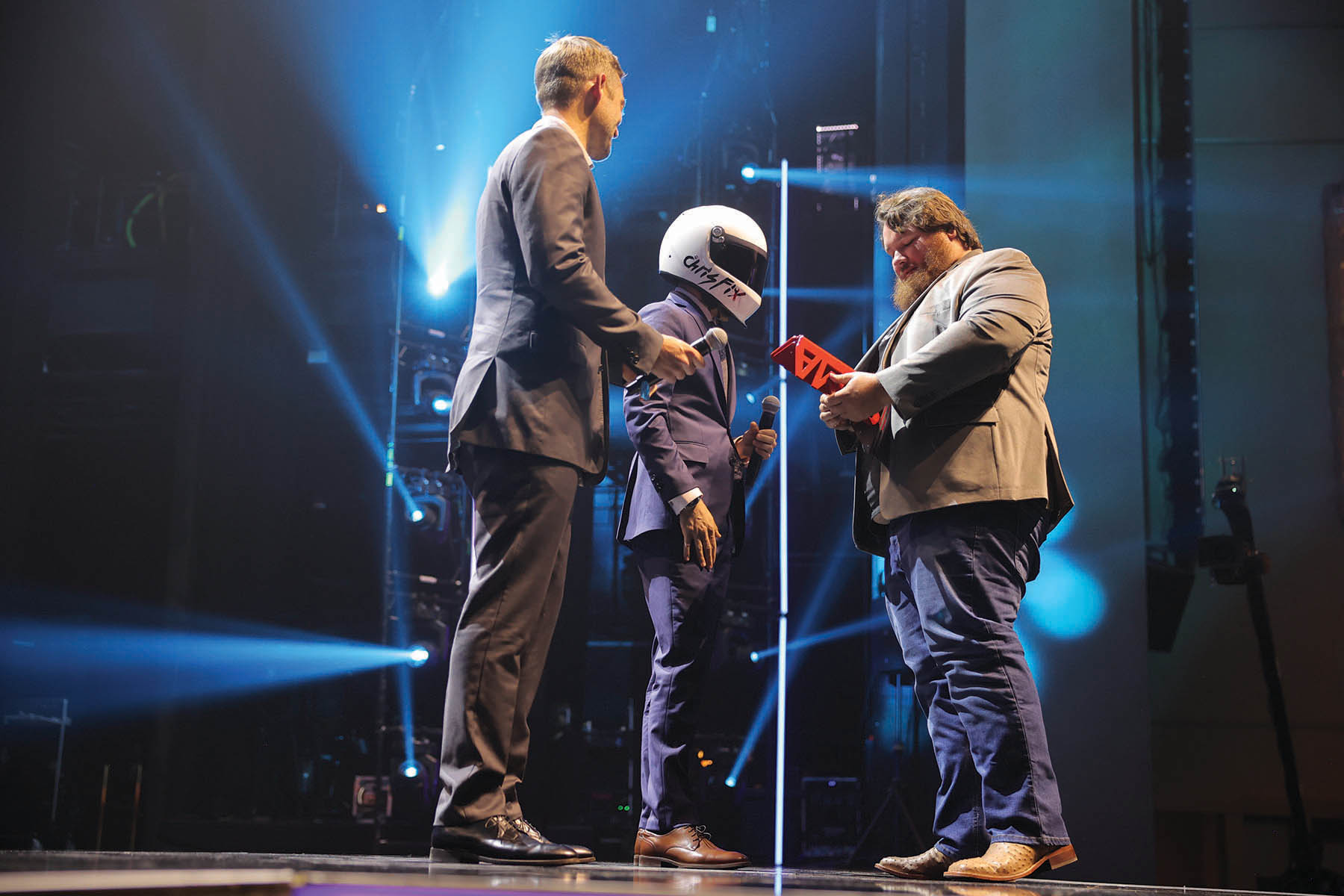 Presentation of SEMA Award to recipient on stage at the Industry Honors